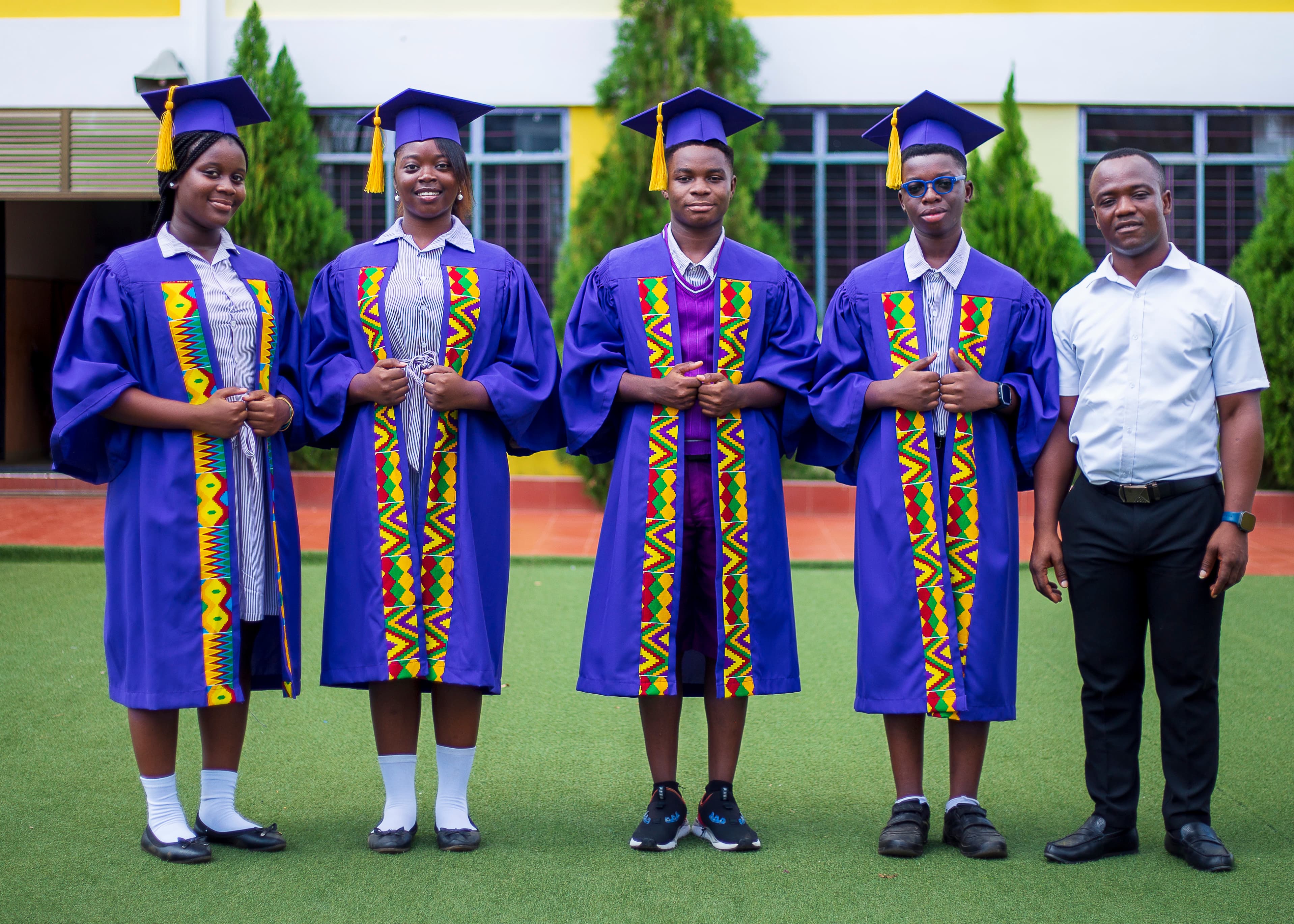 HABIS junior high graduates with a teacher